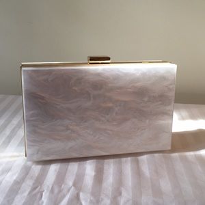 Rachel Zoe White marbled clutch